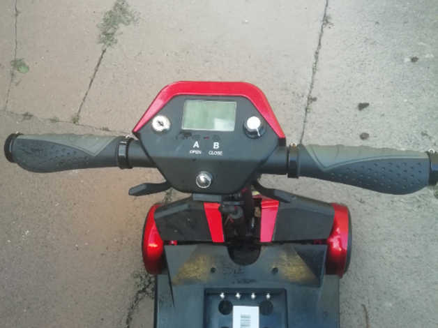 Four wheel auto folding scooter in Burry Port